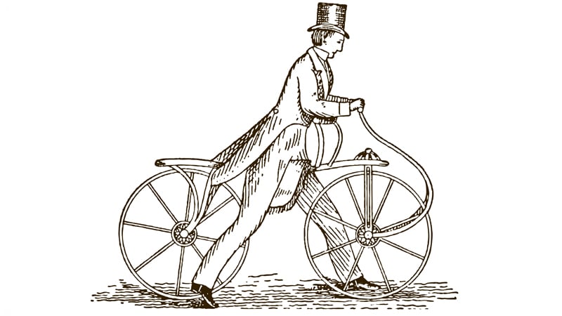 Illustration eines Mannes in formeller Kleidung mit Zylinder und langem Mantel, der ein frühes Modell eines Fahrrads ohne Pedale – eine Draisine oder ‚Laufmaschine‘ – fährt.